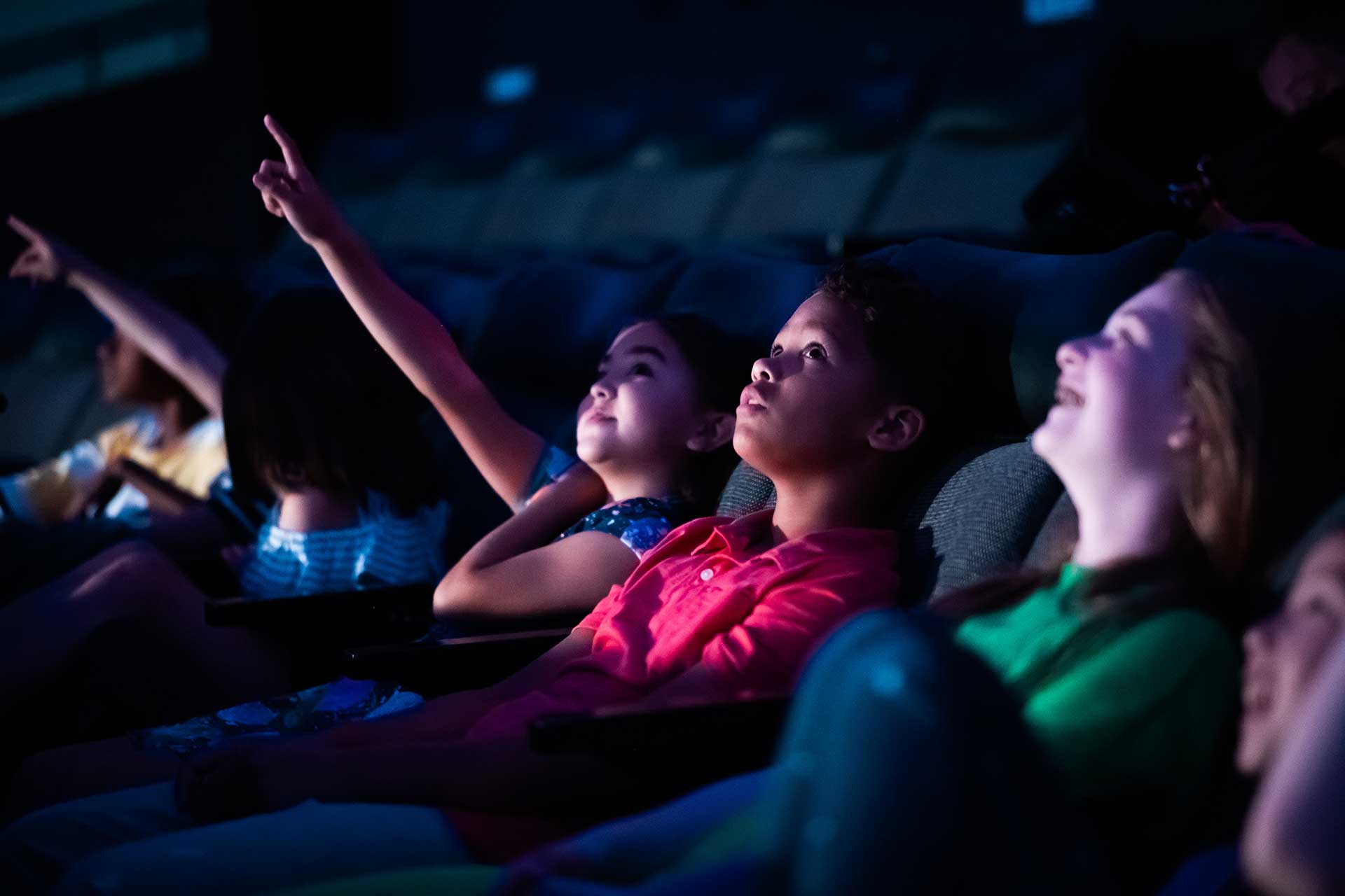 Brand_Image_Still_Planetarium_Med-Kids-Pointing-Looking-in-Awe-SMALL Kids in a Planetarium